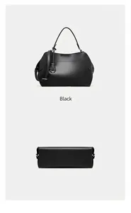 Vue détaillée du sac cabas en cuir noir montrant la structure du fond et la boucle en métal
