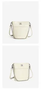 Vue détaillée du sac seau en cuir ciré blanc avec fermoir rotatif argenté et bandoulières