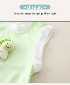 Detail of shoulder button on light green cotton baby romper for easy dressing