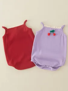 Cotton baby bodysuit with lace collar and cherry detail in red and purple