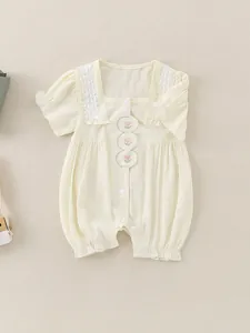 Sweet cream baby girl romper with floral embroidery and lace trim for summer wear