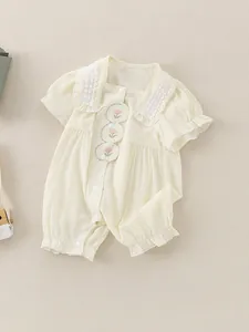 Sweet baby girl summer romper in beige cotton with lace collar and floral embroidery