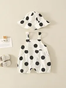 Polka dot baby romper set with matching sun hat in breathable cotton for summer