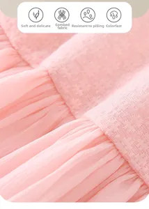 Detail of pink summer dress fabric showing soft pleats and skin-friendly textured weave