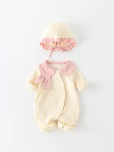 Cute cotton baby girl romper set with matching sun hat in cream and pink ribbed fabric