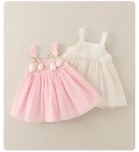 Detail of sweet toddler summer dresses featuring lace embroidery and tulip floral accents