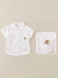 Kids short sleeve white cotton shirt featuring cute bear patterns and button-down collar