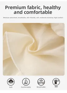 Détail du tissu en coton crème pour barboteuse bébé montrant une texture douce et respirante