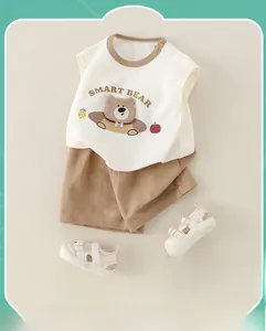 Detail of baby summer cotton outfit set with smart bear print and mesh sandals