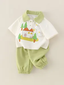Ensemble 2 pièces en coton pour bébé garçon avec polo vert et pantalon à motif canard