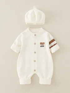 Knitted infant romper and beret set in cream white with bear embroidery