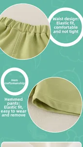 Detail view of cotton baby shorts showing elastic waistband and hem stitching