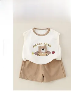 Detail of baby cotton sleeveless top with bear print and breathable honeycomb fabric