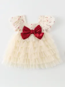 Barboteuse à fleurs pour bébé fille avec manches bouffantes et grand nœud rouge