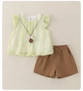 Detailed flat lay of toddler girl flutter sleeve top and shorts set in light green