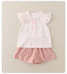 Flachbild von Sommer-Zweiteiler für Mädchen mit rosa Schleifenprint und Shorts
