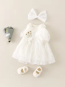 Baby girl off-white lace romper set with sunflower embroidery and matching headband and shoes