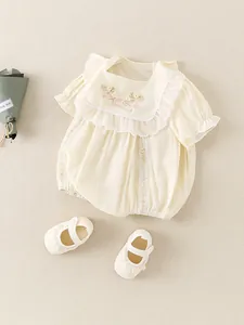 Cute baby girl cotton bodysuit with floral embroidery and matching soft-sole walking shoes