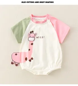 Close-up of baby short sleeve bodysuit with giraffe print and snap button closure