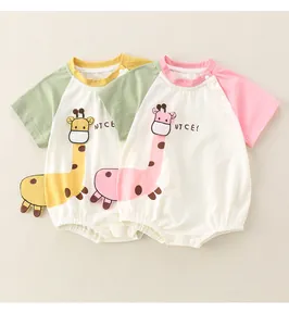 Detail of newborn short sleeve rompers with giraffe embroidery and snap buttons