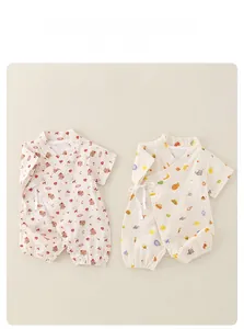 Detail of short sleeve cotton baby rompers with Japanese tie-up and cute cartoon patterns