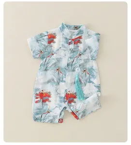 Close-up of baby romper showing Chinese mandarin collar, knots and lotus ink pattern