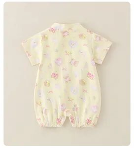 Close-up of thin cotton baby bodysuit with cute rabbit and bear cartoon prints