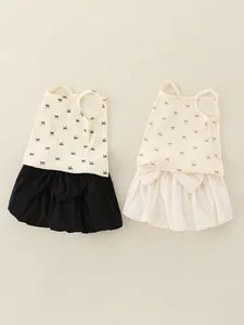 Schattige babyset met strikje en pofbroekje in zwart en beige uitvoering