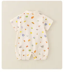 Macro detail of breathable cotton baby romper with colorful cartoon animal print