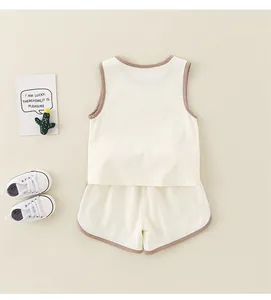 Ensemble d'été sans manches en coton pour bébé blanc cassé avec bordure brune et chaussures