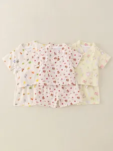 Lot de trois pyjamas pour bébé en gaze de coton à manches courtes et motifs mignons