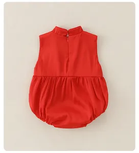 Detail of red sleeveless baby bodysuit with mandarin collar and back zipper