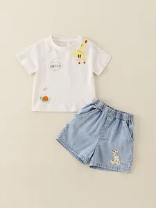 Summer kids set with white cartoon giraffe T-shirt and blue denim shorts for boys and girls
