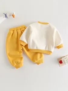 Set in cotone per neonati con felpa color crema e pantaloni sportivi gialli per bambini