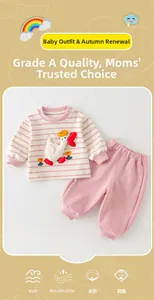 Detail of baby cotton set showing cartoon goose embroidery and soft Class A striped fabric