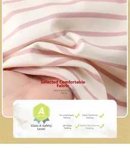 Close-up of Class A certified pink striped cotton fabric showing soft texture for infants