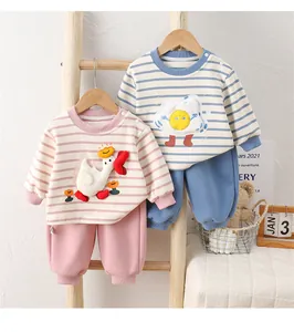 Detail showing baby cotton striped sets with cute 3D duck and egg cartoon appliques