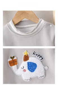 Close-up of baby gray sweatshirt with elephant embroidery and shoulder snap buttons