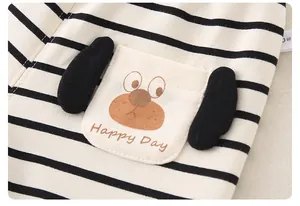 Détail du pull à rayures en coton pour bébé avec poche chiot dessin animé et oreilles 3D