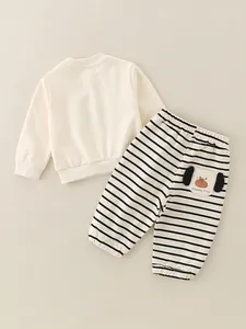 Ensemble en coton pour garçon avec sweat crème et pantalon rayé orné d'un petit chien