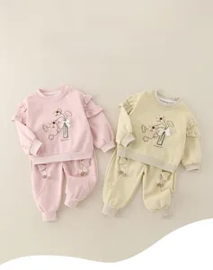 Detail of floral embroidery and 3D bow on pink cotton toddler sweatshirt set