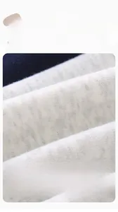 Close-up of soft brushed cotton fabric texture showing breathable and anti-pilling detail