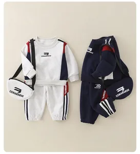 Detail view of cotton infant tracksuit set with hoodie, joggers and small matching bag