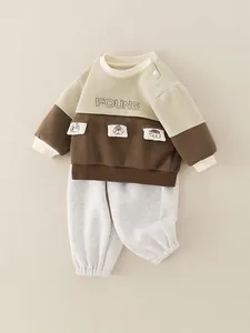 Infant boy spring two-piece set featuring color-block sweatshirt and grey joggers
