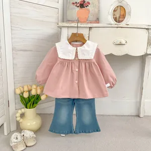 Girl's preppy pink long sleeve top with lace collar and blue flared denim pants set