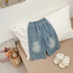 Kids loose wide-leg light blue denim shorts with elastic waist and washed finish