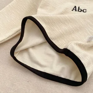 Toddler boy waffle knit long sleeve tee with Abc embroidery and contrast cuffs
