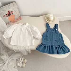 Sweet toddler girl 2-piece set with heart-embroidered denim pinafore and ruffle-collar shirt
