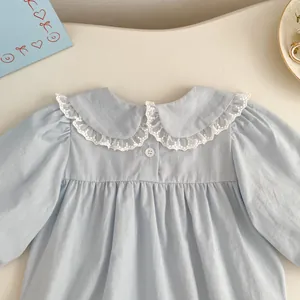 Light blue infant long sleeve romper with white lace collar and ruffle pleat details
