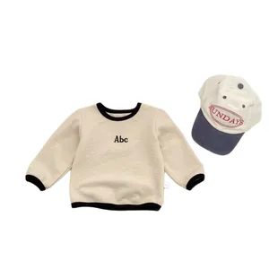 Toddler beige waffle knit long sleeve T-shirt with black letter embroidery and ribbed cuffs
